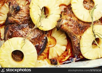 Fresh juicy delicious meat steak roasted in pineapple marinade. BBQ, food background. Barbecue steak with pineapples, close up