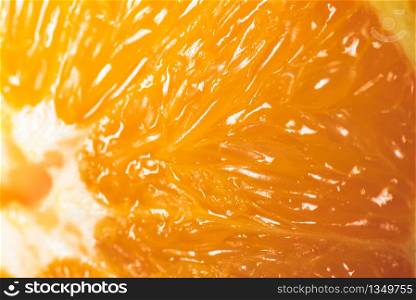 Fresh juicy orange macro detail background. Macro shoot. Fresh juicy orange macro detail background
