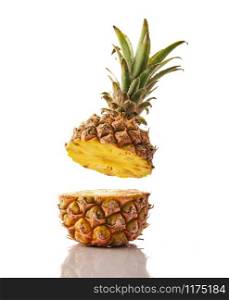 Fresh juicy pineaplle flying on white background. Ananas levitation