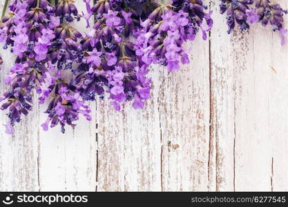 Fresh lavender on the white shabby wooden table