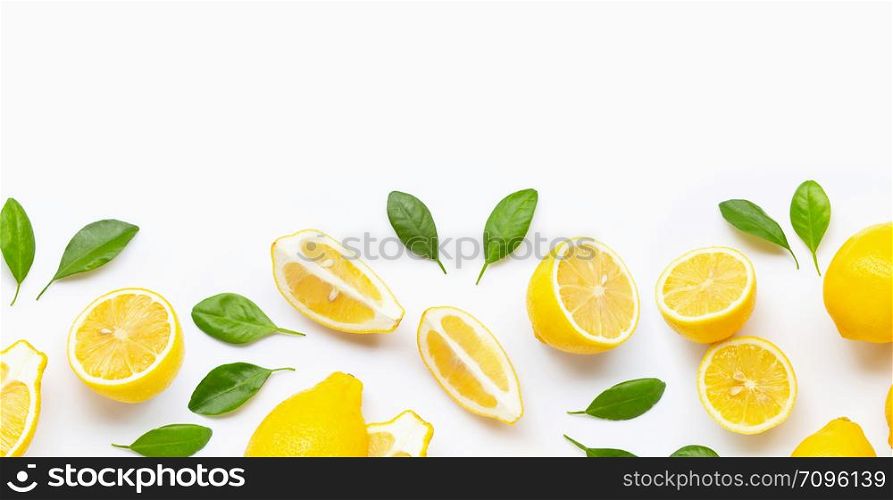 Fresh lemon and slices with leaves isolated on white background.