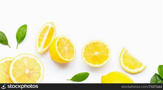 Fresh lemon and slices with leaves isolated on white background. Copy space
