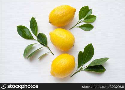 Fresh lemon on a white background.. Fresh lemon on a white background. Top view