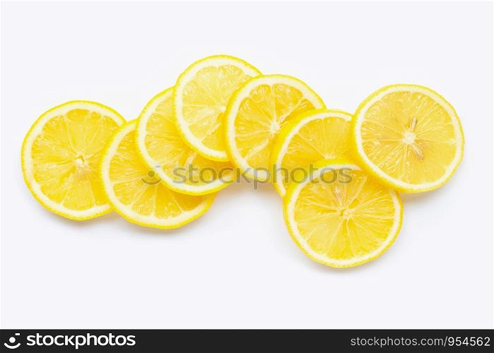 Fresh lemon slices on white background.