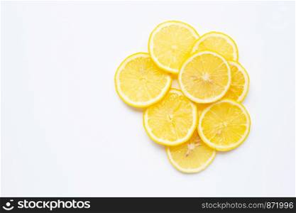 Fresh lemon slices on white background. Copy space