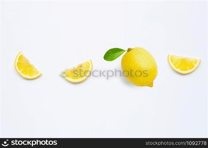 Fresh lemon with green leaf on white background.