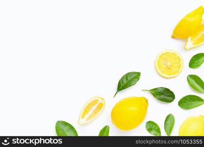 Fresh lemon with green leaves on white background.