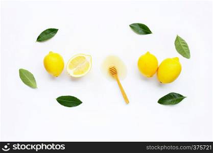 Fresh lemon with honey on white background.