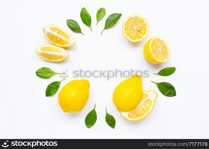 Fresh lemon with leaves isolated on white background.