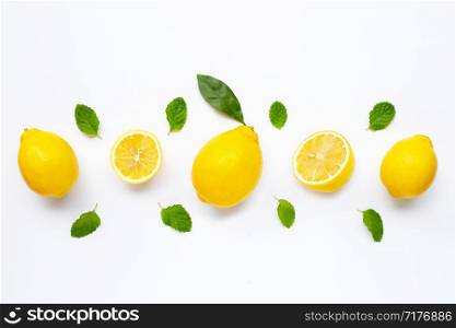 Fresh lemon with mint leaves isolated on white background.