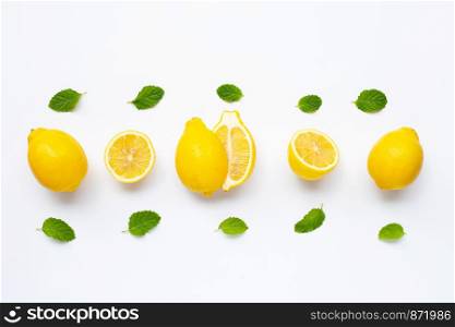 Fresh lemon with mint leaves isolated on white background.