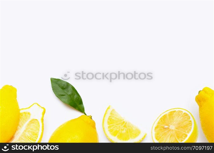 Fresh lemon with slices isolated on white background.