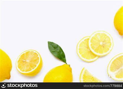 Fresh lemon with slices isolated on white background.