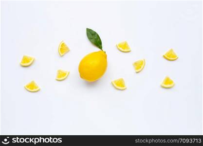 Fresh lemon with slices on white background.