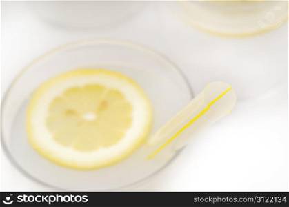 fresh lemonade drink with lemon slice closeup