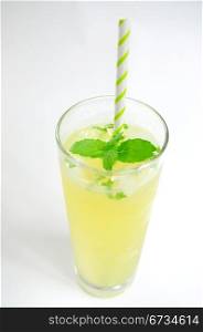 Fresh lemonade in glass with mint leaf