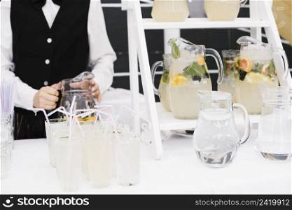 fresh lemonade with straws table