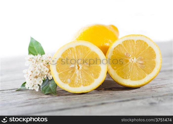 Fresh lemons cut in half and trimmed