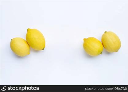 Fresh lemons on white background.
