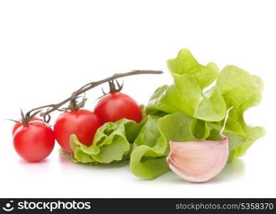 Fresh lettuce salad leaves bunch and cherry tomato isolated on white background cutout