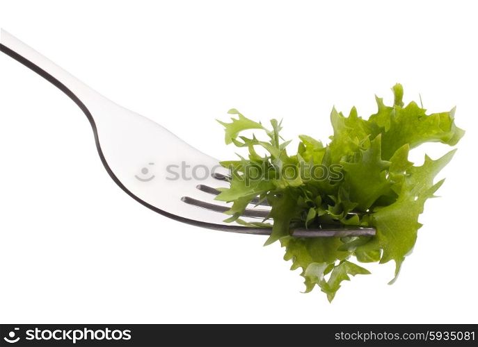 Fresh lettuce salad on fork isolated on white background cutout. Healthy eating concept.