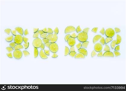 Fresh lime slices isolated on white background. Top view