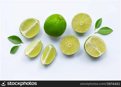 Fresh lime with leaves on white background.