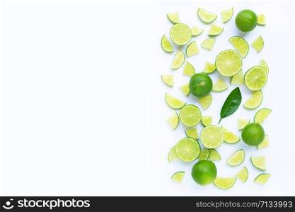 Fresh lime with slices isolated on white background. Copy space