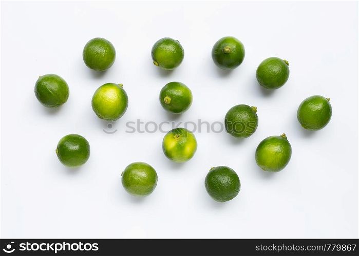 Fresh limes isolated on white background.