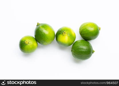 Fresh limes isolated on white background.