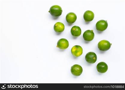 Fresh limes isolated on white background. Copy space