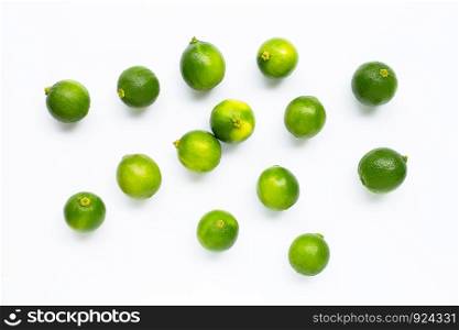 Fresh limes isolated on white background. Top view