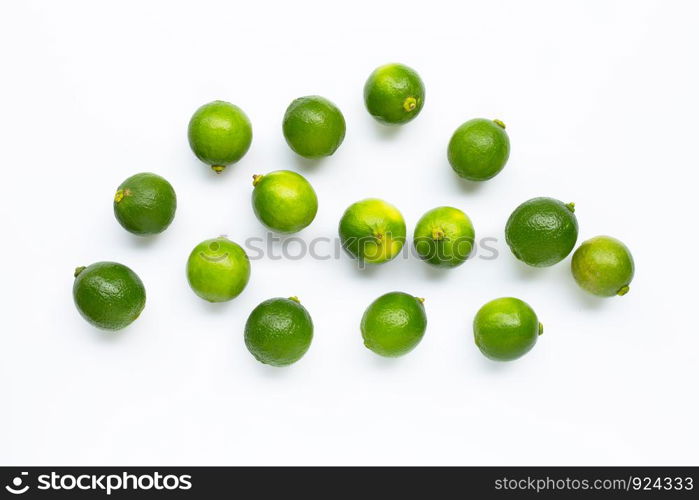 Fresh limes isolated on white background. Top view