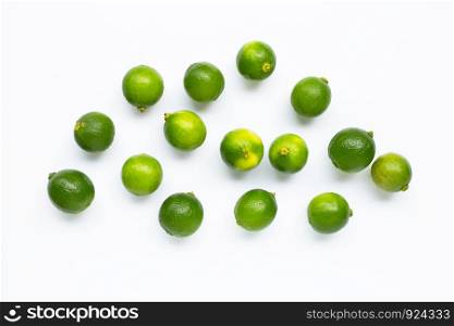 Fresh limes isolated on white background. Top view