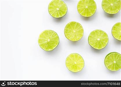 Fresh limes with on white background. Copy space