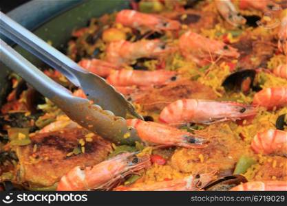 Fresh made Paella on a french market