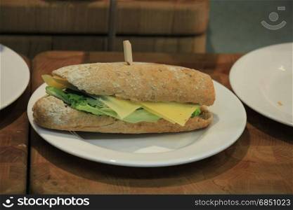 Fresh made whole grain sandwich with lettuce and cheese