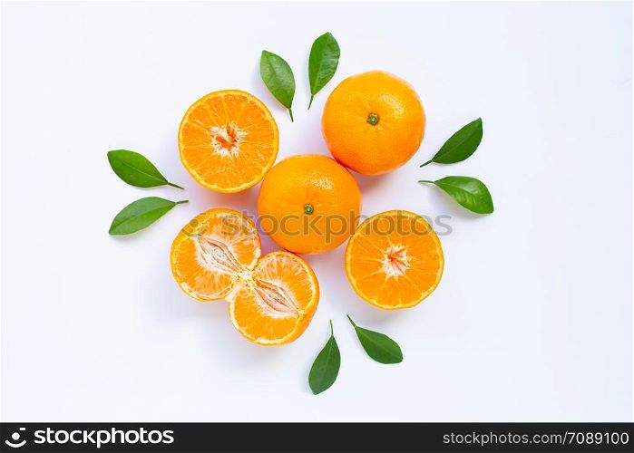 Fresh mandarin orange with leaves on white background. Juicy and sweet and renowned for its concentration of vitamin C