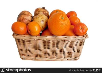 Fresh mandarins,oranges and pomegranates ln wicker basket on white background