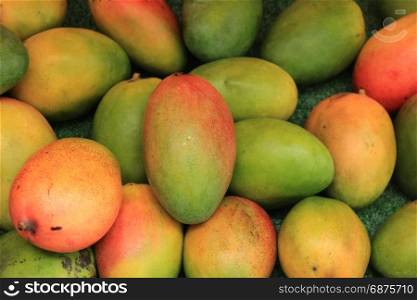Fresh mangoes on a market stall