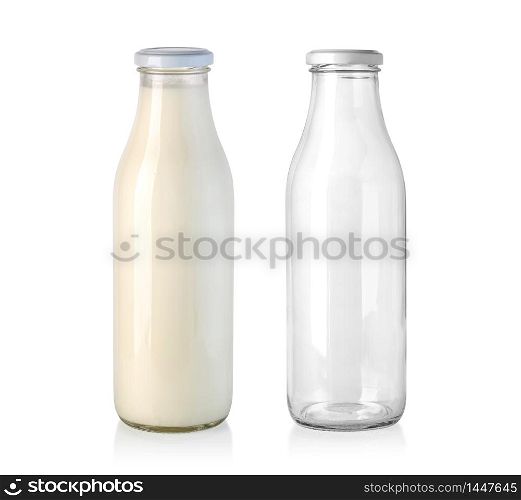 Fresh milk in a glass bottle and empty isolated on white background with clipping path