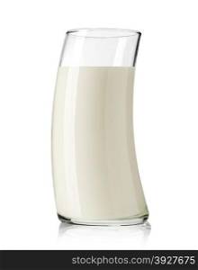 fresh milk in the glass curved on white background, isolated