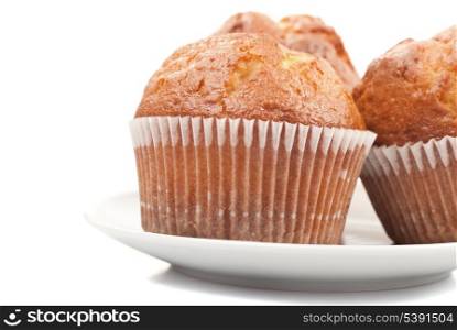 fresh muffins isolated on white background