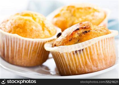 fresh muffins on a plate