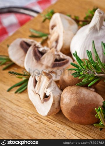 Fresh mushrooms on wooden backgroun