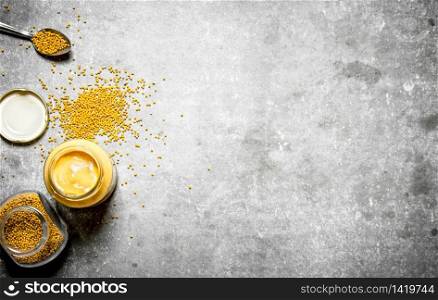 Fresh mustard with seed. On the stone table.. Fresh mustard with seed.