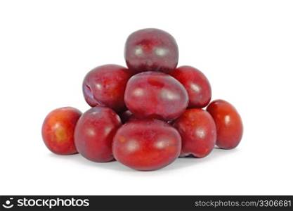 Fresh natural ripe plums isolated on white