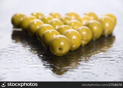Fresh olives and drops of water