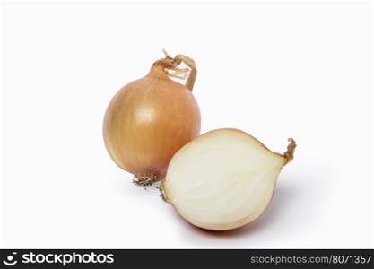 Fresh onion bulbs on a white background.. Fresh Onion Bulbs.