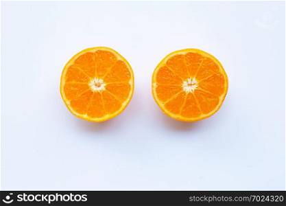 Fresh orange citrus fruit on white background.